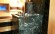 Печь банная ИзиСтим Сочи в трехстороннем кожухе из змеевика с открытым верхом